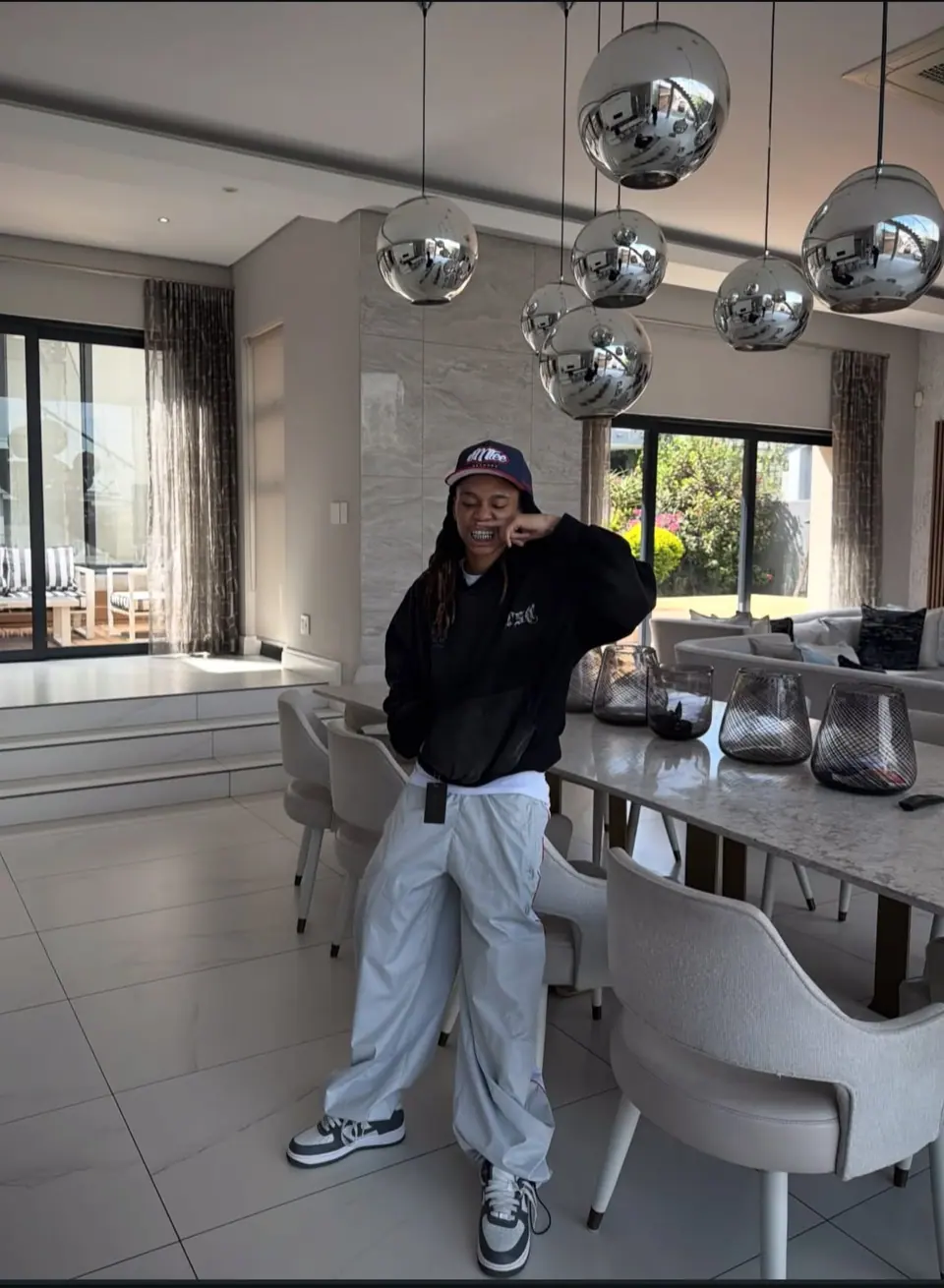 OG hoodie at home under mirror balls